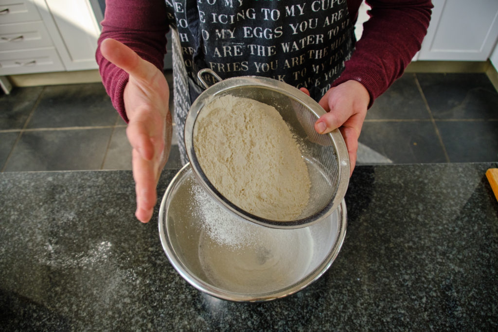 Getting the flour ready before making puff pastry.