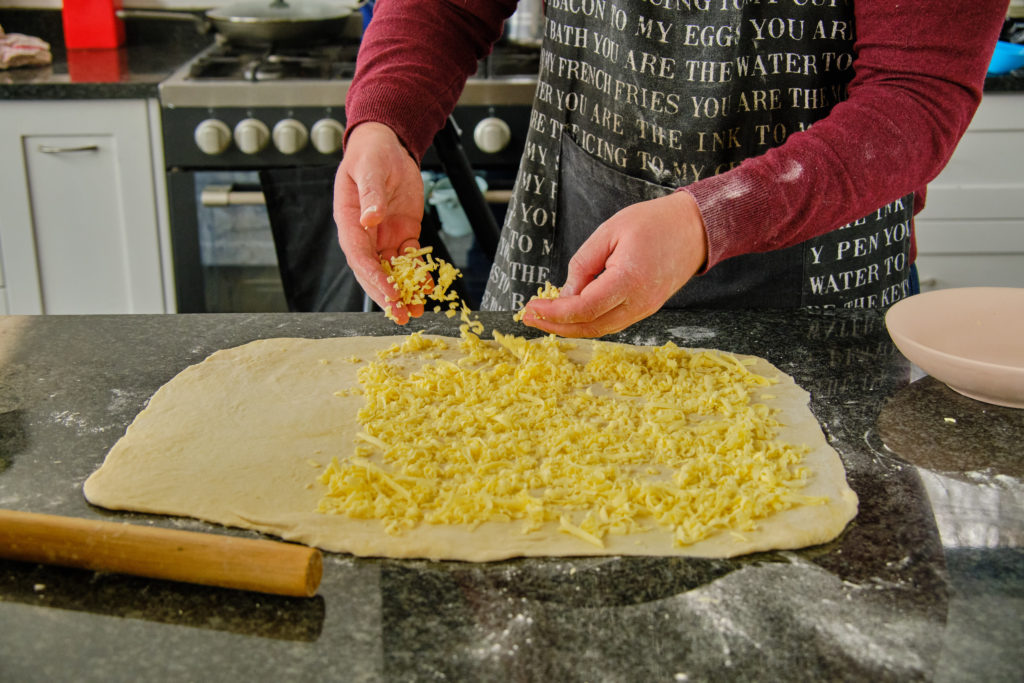 Cover two thirds of the dough with butter.