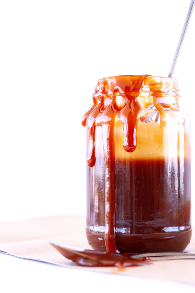 A jar of caramel sauce.