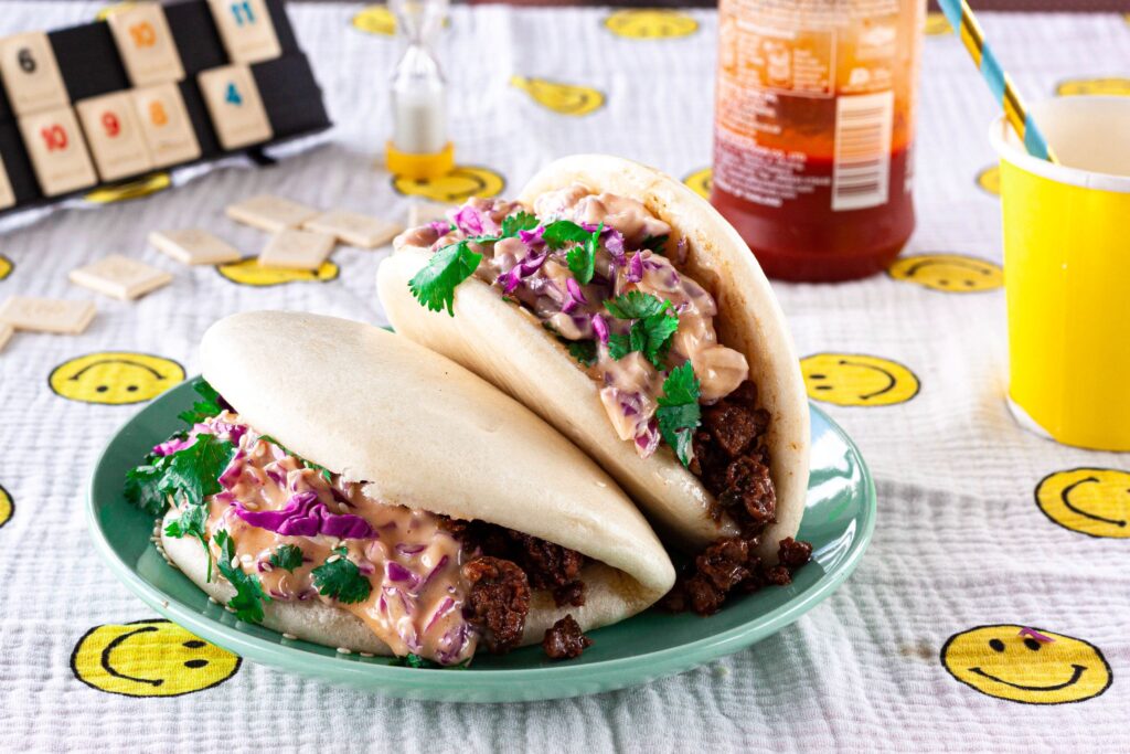 Lamb bao buns with sriracha mayo coleslaw