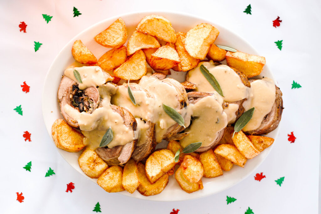 Pork roast roll with mushrooms, sage and apple cider sauce