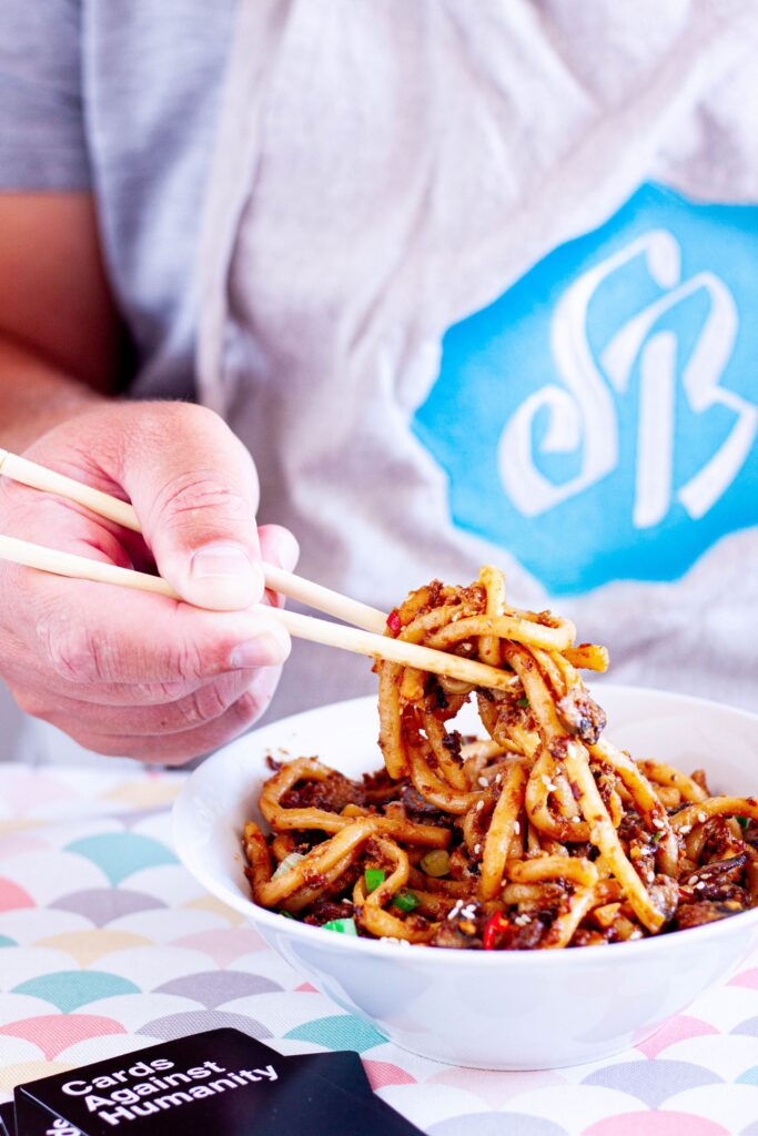 Quick peanut butter udon noodles with stir-fried mushrooms