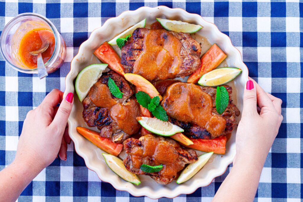 Pork steaks with papaya mint puree